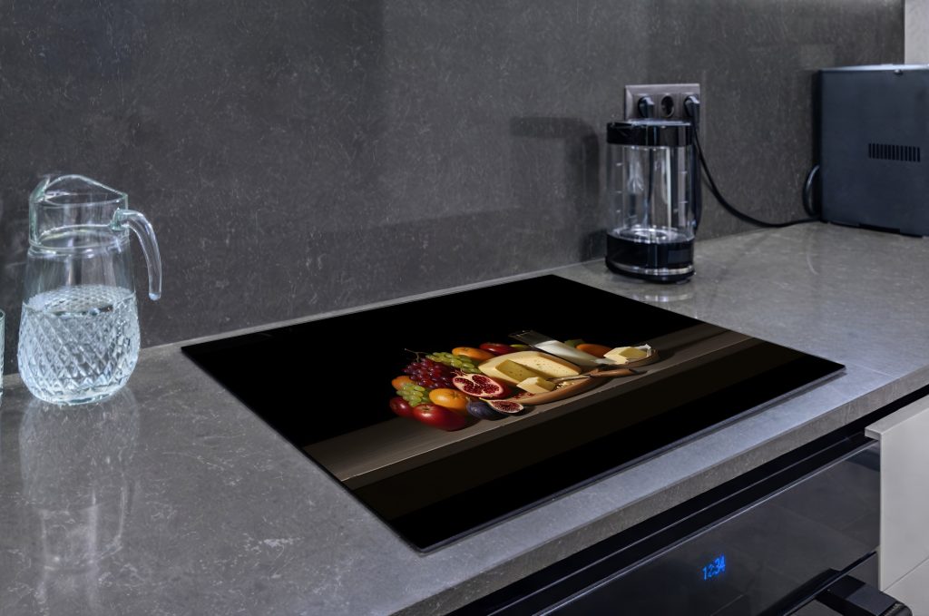 Afdekmat met een stilleven van een collectie aan fruit